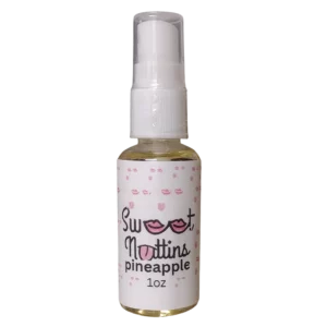 Pineapple flavored intimacy spray bottle from Sweet Nuttins with tropical-inspired styling