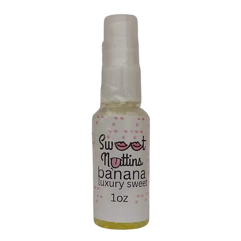 Luxury Line - Banana flavored intimacy spray bottle from Sweet Nuttins on a transparent background