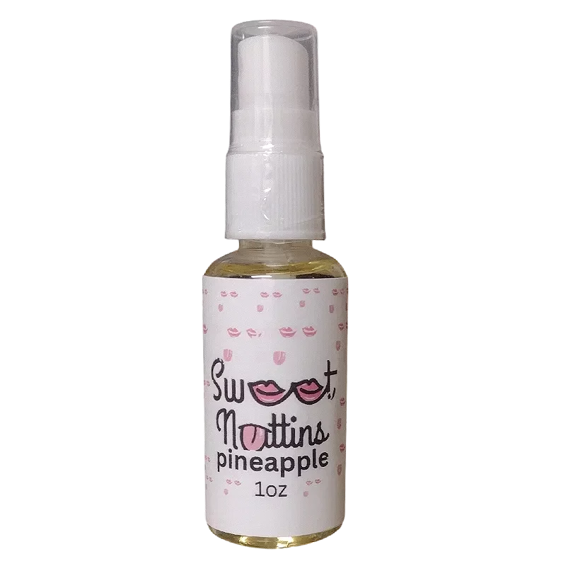 Pineapple flavored intimacy spray bottle from Sweet Nuttins with tropical-inspired styling
